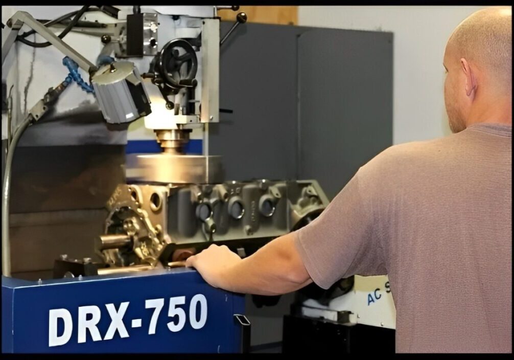 Man operating DRX-750 engine milling machine.